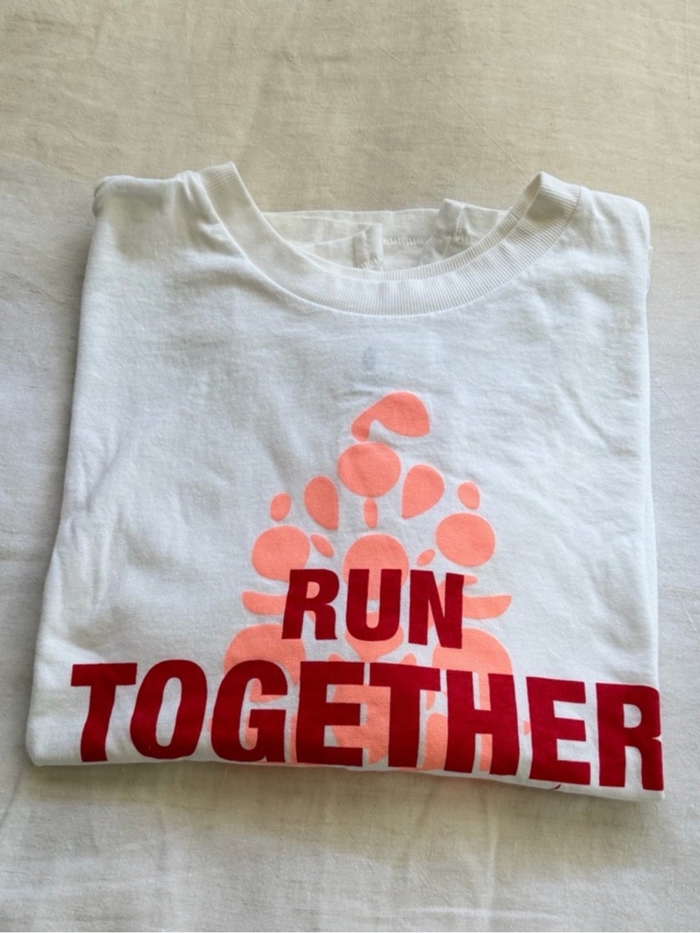 FP Movement by Free People White Tee with Coral Graphic and Red Text